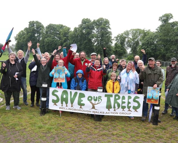 Wellingborough Walks Action Group celebrate next to the trees/National World