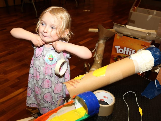 The Core at Corby Cube 5th birthday celebrations - giant marble run - Chloe Mellon, 4, adds some bits to the marble run (November 2015)