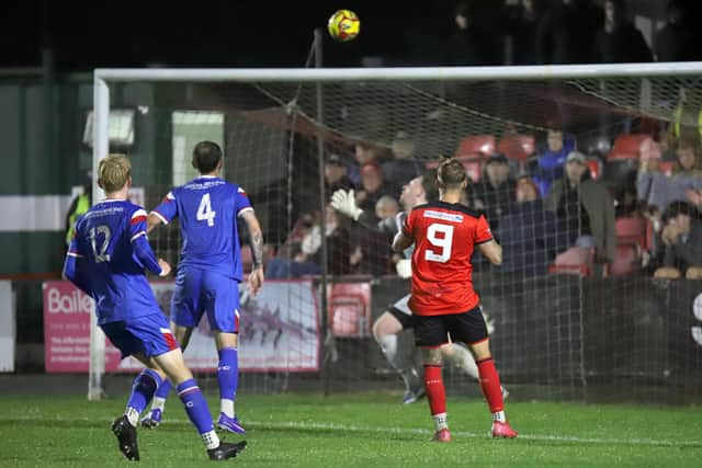 Eddie Panter loops a header home to make it 2-0 (Picture: Peter Short)