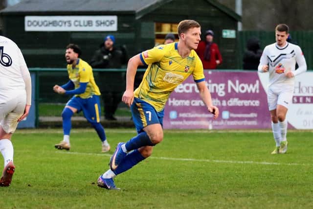 Danny Draper runs away to celebrate netting the winner for Wellingborough Town against Carlton Town on Saturday (Picture: Rob Webb)