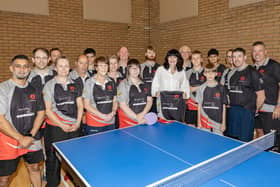 Corby Town Table Tennis Club members with Lynn Carson from Davis Optometrists.