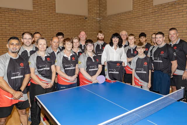 Corby Town Table Tennis Club members with Lynn Carson from Davis Optometrists.