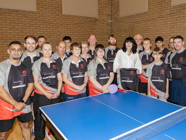 Corby Town Table Tennis Club members with Lynn Carson from Davis Optometrists.