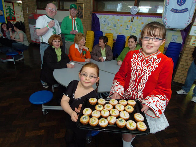 Corby, Our Lady of Walsingham Primary School, St Patrick's Day cakes and coffee l-r Jessica Guerin, 6, and Rebecca Curran, 11, March 2011