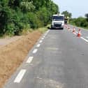 The verge nest to the A605 has been cleared and then an earth bank built
