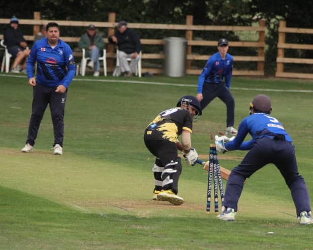 Wicket-taking action from Wollaston's division one win over Peterborough Town IIs (Picture: Finbarr Carroll)