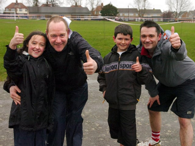 Sport Relief mile, March 2008. From left, Eleanor McHarg and dad Chris and Alex Hinds and his dad Colin after completing the mile