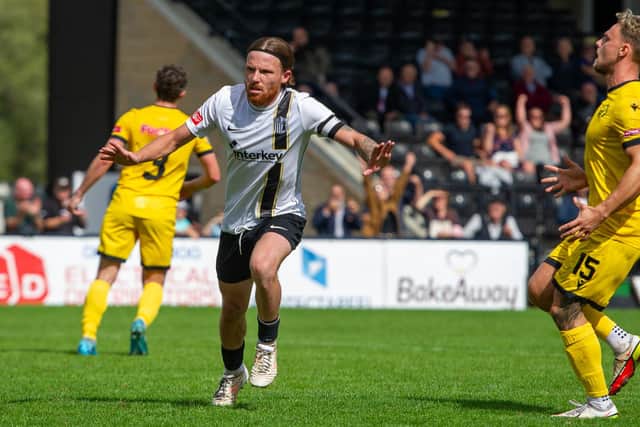 Jordon Craford celebrates scoring Corby's equaliser in their 3-3 draw against AFC Rushden & Diamonds (Picture:Jim Darrah)