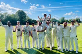 Freddie McGeown's S&L team-mates give him a lift following his incredible bowling figures