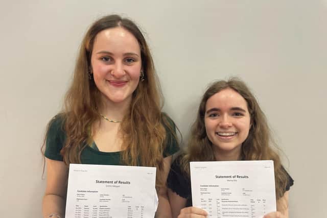 Prince William School students Ella Waring (L) and Abby Simms receive their A level results