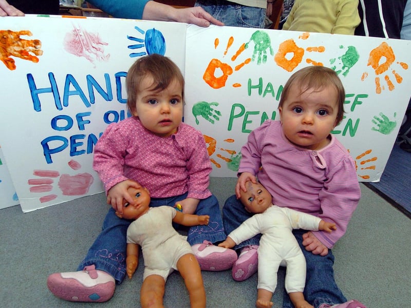Centre users preparing banners and placards in readiness for their protest outside County Hall in 2011. Pictured are twins Karis McLean and sister Alena McLean, 11 months.