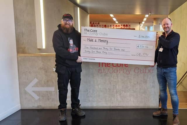 Martyn Still presents a cheque to theatre Director, Joe Flavin