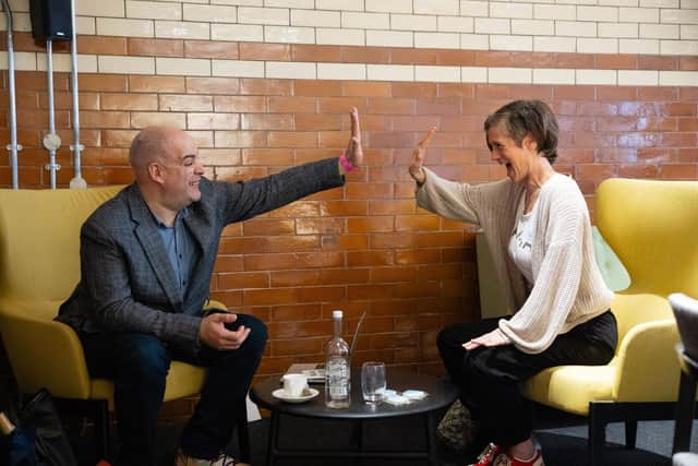 Richard high fives a client to celebrate another successful session