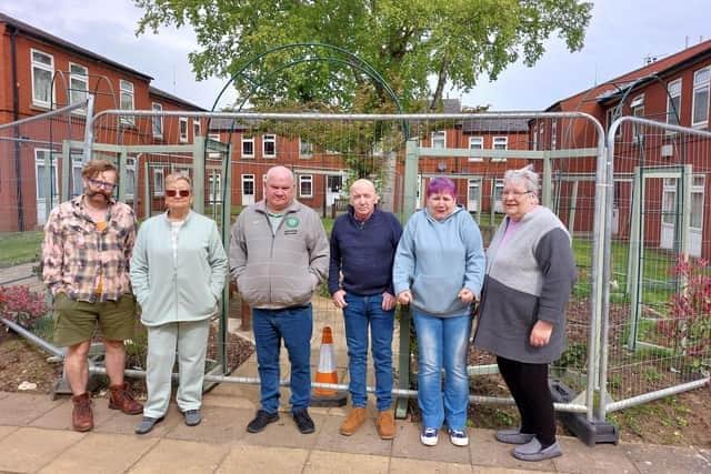 Residents were furious after the communal garden was fenced off