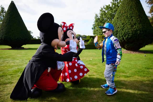 Fraser Hinde with Mickey and Minnie Mouse