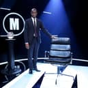 Clive Myrie with Mastermind's black chair