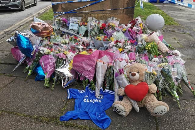 Flowers and messages have been laid at the war memorial in Harborough Road, opposite The Cock Hotel, for the 16-year-old victim