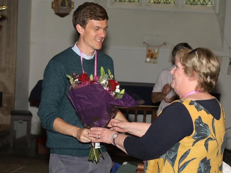 Kettering Festival of Literature 2023 - A bouquet is presented to Monica Ozdemir by Rev Tom Houston