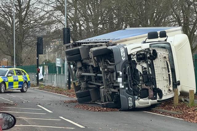 The lorry on its side in Barton Road, Kettering. Image: NW