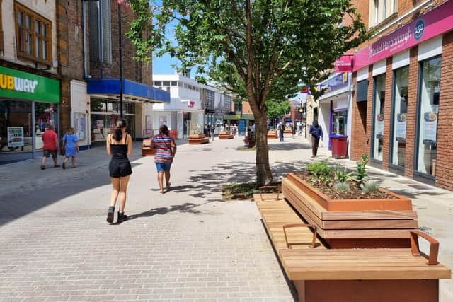 Kettering High Street has had a new surface and planters and benches