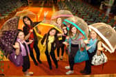 Singing in the rain for a fashion show, March 2009