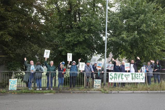 Protestors gathered under the trees in Wellingborough Walks