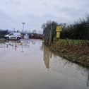 Corby household waste recycling centre has closed due to flood water at the entrance to the site