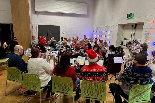 Corby Mayor Callum Reilly taking the lead at the Oakley Vale Community Centre Christmas Carols