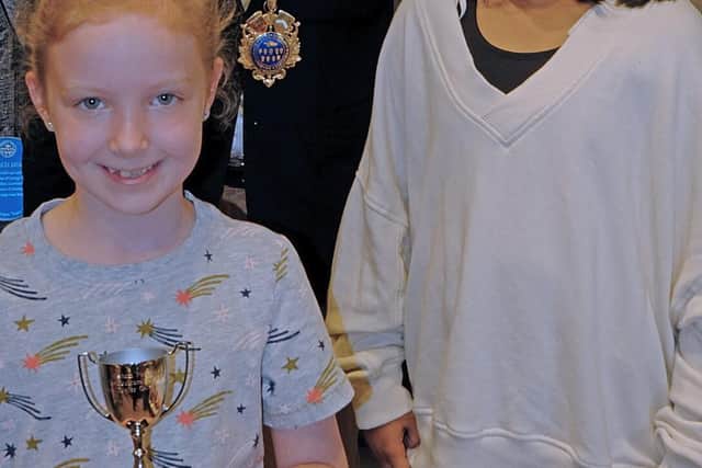 Penny Moth with the cup for being the Best Junior Gardener, presented by Mayor Cllr. Vijay Paul