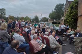 The meeting, which had been intended to take place in Rushden Hall, had to be moved outside due to the number of people who attended