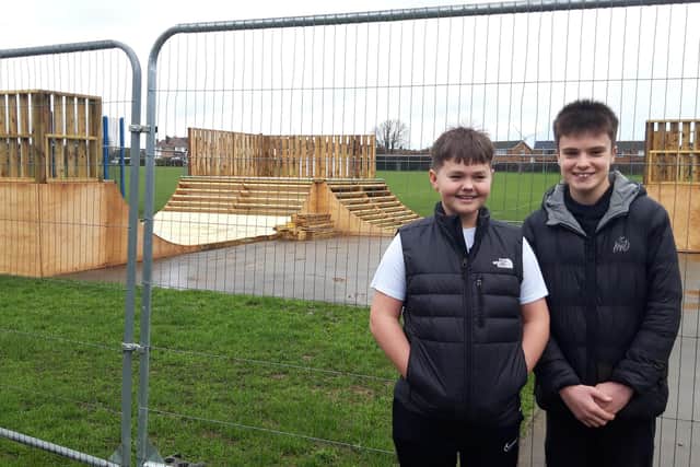 Jamie Neyland and Alfie Brown, pictured with the skate ramps as work was progressing