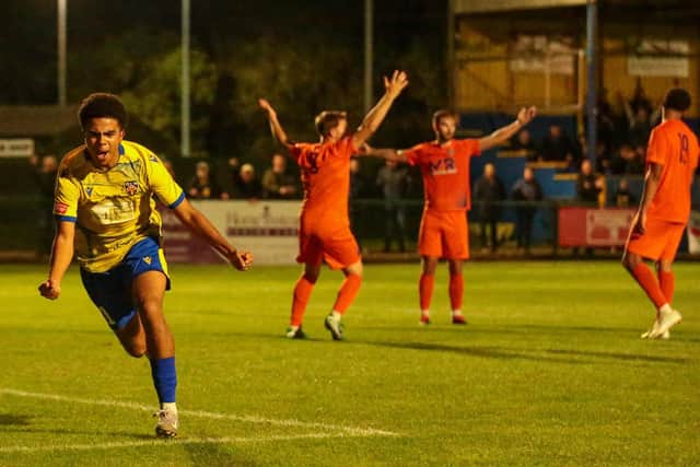 Taylor Franklin thinks he has scored the winner for Wellingborough Town against Corby Town on Tuesday - but his celebrations were cut short by an offside flag (Picture: Rib Wobb Photography)