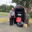 Selina Bhambra (income recovery team leader at Greatwell Homes) and Tony Smith (area manager at Salvation Army) at the clothing bank in Henshaw Road, Wellingborough