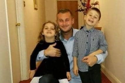 Tom Sturgess with his children family photo supplied to Northamptonshire Police