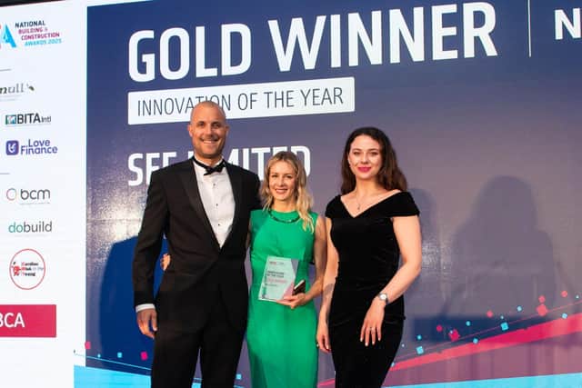 Robert Thompson (left) and Inga Gusauskaite (right) from See Limited accepting their Innovation of the Year award at the National Building and Construction Awards.