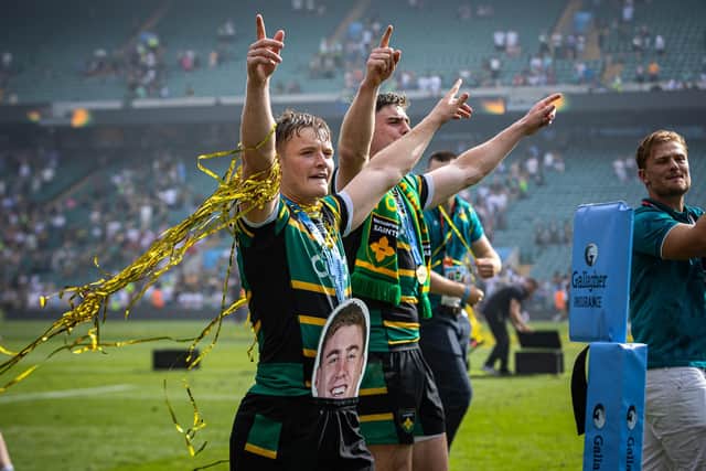Fin Smith celebrated with a Tommy Freeman mask tucked in his shorts (picture: Adam Gumbs)