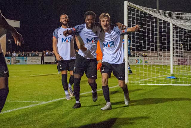 Hilton Arthur and Scott Floyd celebrate after the latter set up the former for his second goal of the game in Corby Town's 4-1 win over Yaxley on Wednesday night. Picture by Jim Darrah
