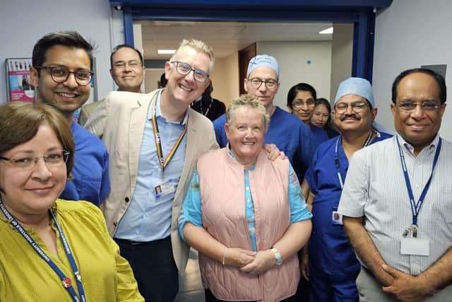 Glennis Hooper and the Crazy Hats team donated thousands of pounds to the breast unit