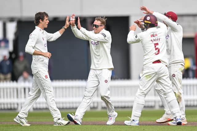 Calvin Harrison celebrates one of his four first-innings wickets against Lancashire at Old Trafford (Picture: Luke Adams)