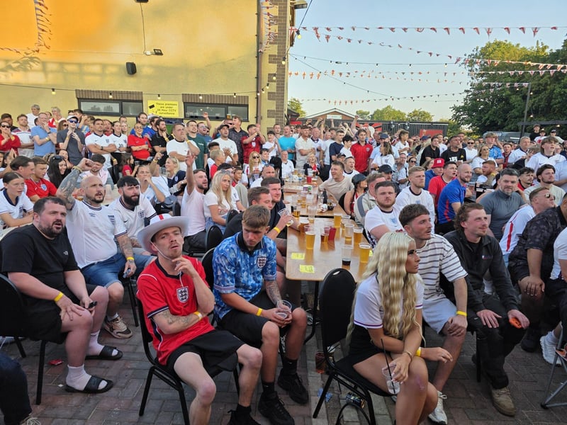 Fans at the Kettering Town FC World Cup Fan Zone watch England vs Argentina in the semi-final