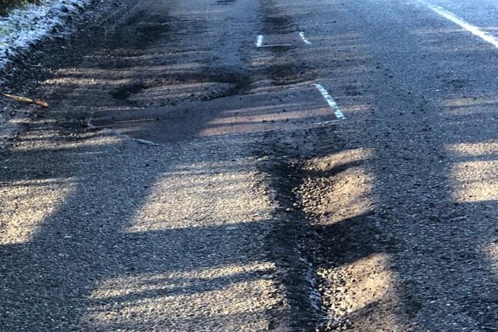 Amanda Jones sent us this picture: "Potholes and the surface of the road disintegrating in Mawsley, they get fixed and keep coming back"