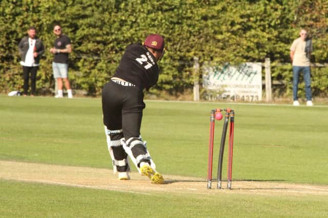 Overstone's James Sales is bowled by Desborough's Corey Young