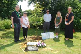 A service was held at KGH to bury memorial crosses to those lost during the pandemic.