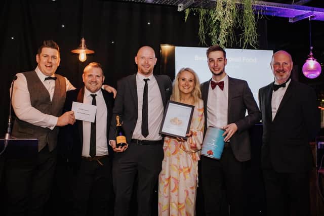Pub staff celebrate the award