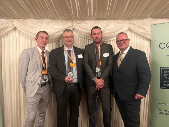SENDS 4 Dad members with winning trophy met Lee Barron MP