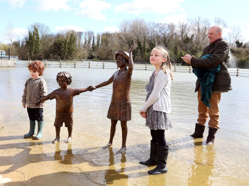 Wicksteed Statues: Kettering: Wicksteed Park lake restoration project finished with final unveiling of the statue of children by the children who posed for the sculpture. Victor Groves, 5, and Megan Phillips, 9, unveiled the sculpture helped by Oliver Wicksteed (chairman of Wicksteed Charitable Trust)    March 31 2015