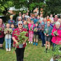 Vicky Geary and the team of volunteers and supporters for 5th Kettering Scout Group plant sale/National World