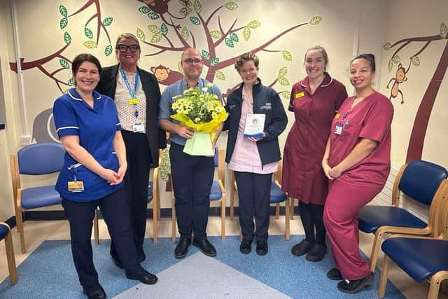 Healthcare Assistant Hannah Medlicott presented with her award.