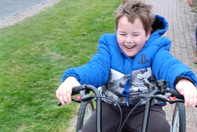 Filip has a new special trike thanks to the community's generosity