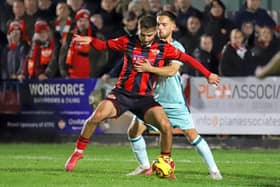 Theo Alexandrou on the ball in the win against Rushall Olympic (Picture: Peter Short)
